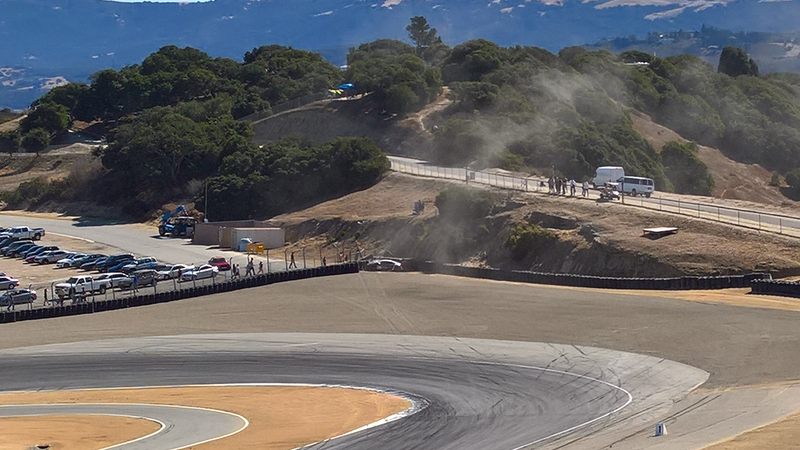 This poor R8 driver was being pressured into the hairpin, overcooked it and locked up sending him straight into the fence. This would change the whole race.